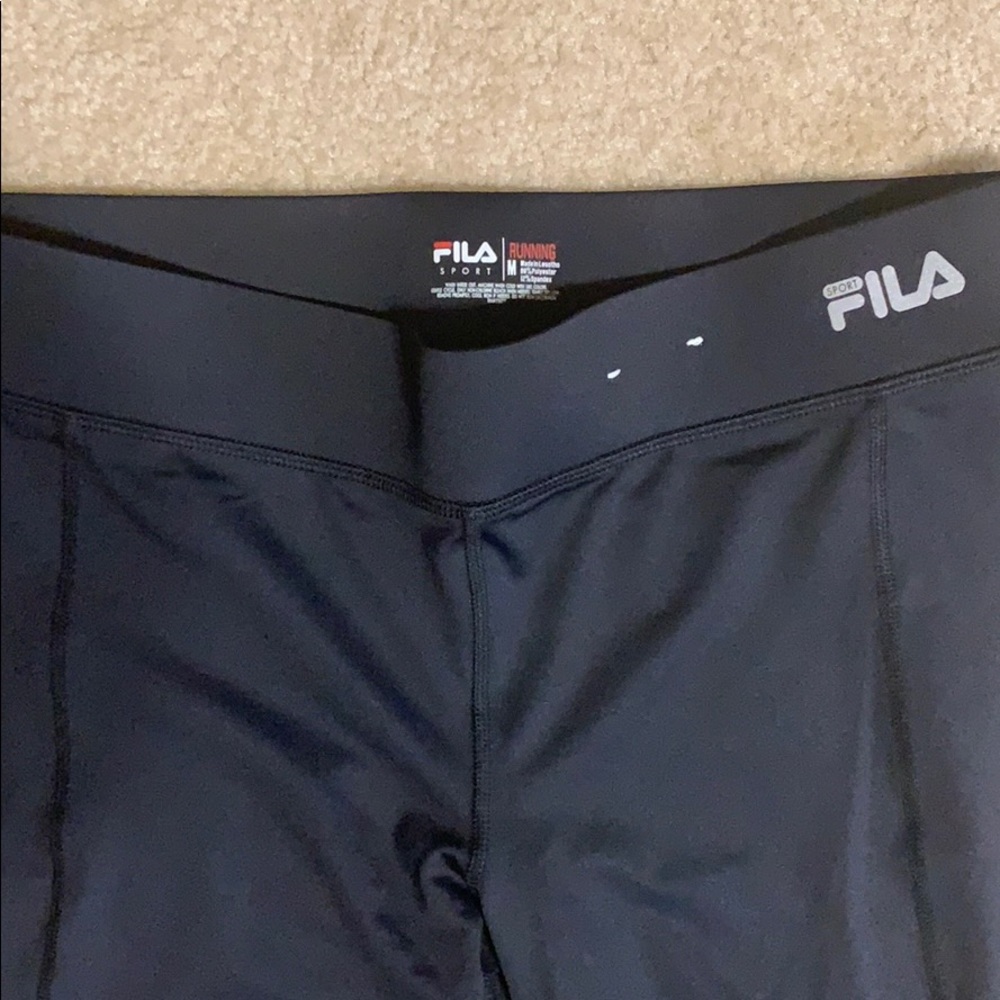 New W/o tags.FILA performance running pants women’s M